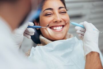woman receiving dental attention