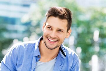 man with white teeth smiling